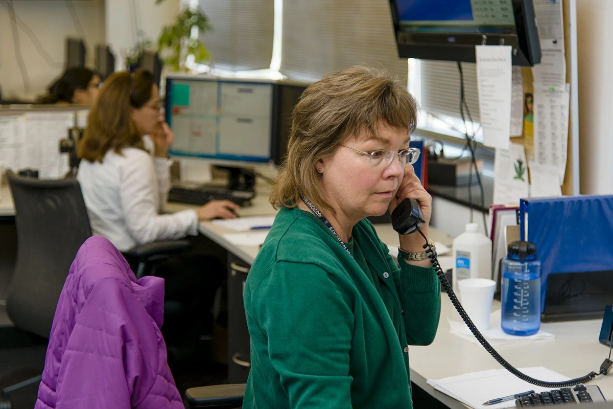 Poison Control Staff on Phone